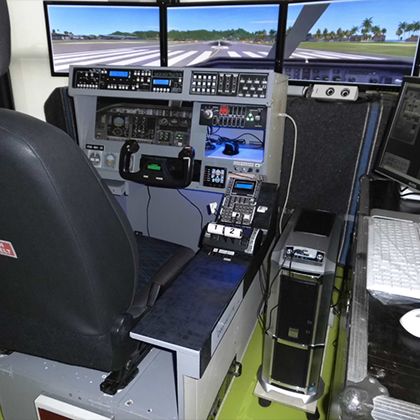 Single seat general aviation simulator with avionics stack and triple screens